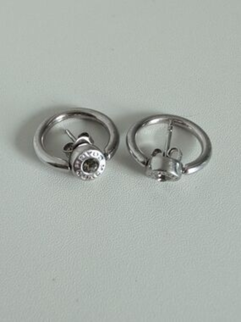 Coach Silver Hoop Earrings with Clear Stone Accents